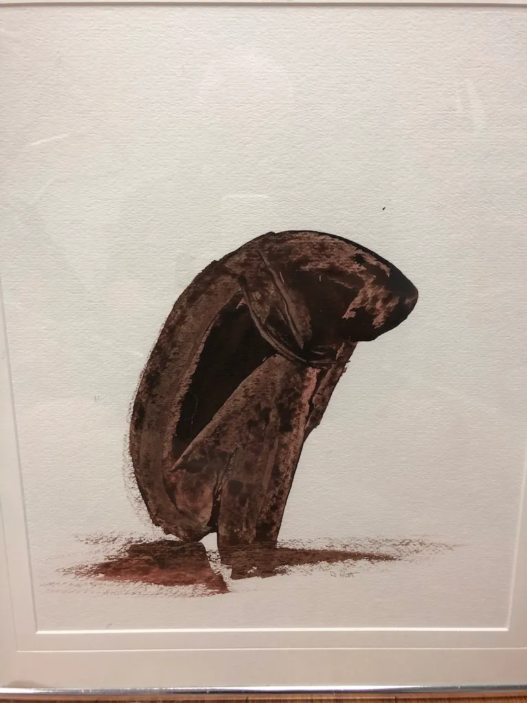 The same brown wash painting seen closer, the bowed figure dissolving into the stain beneath it.